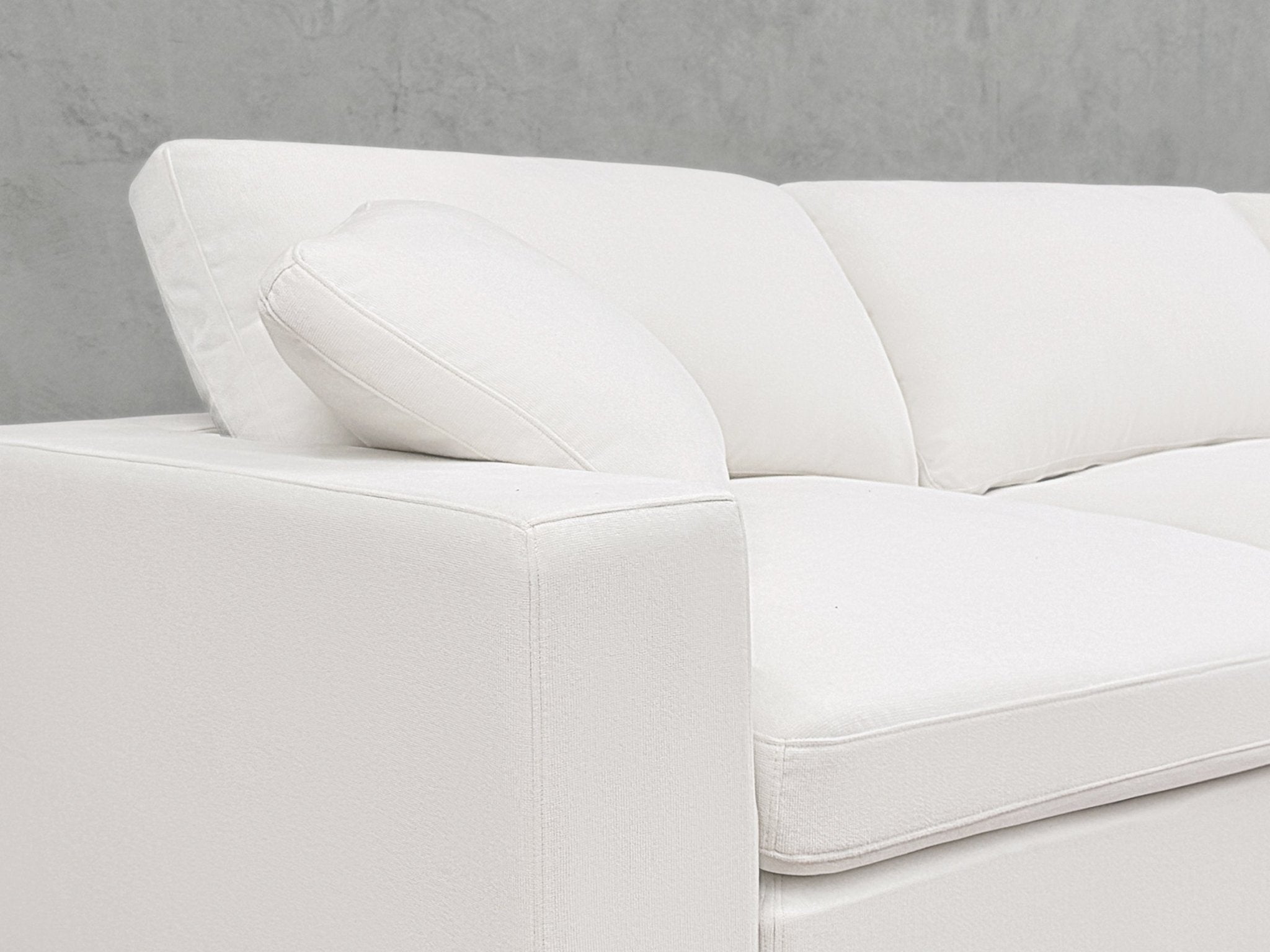 Close-up of arm and cushion
