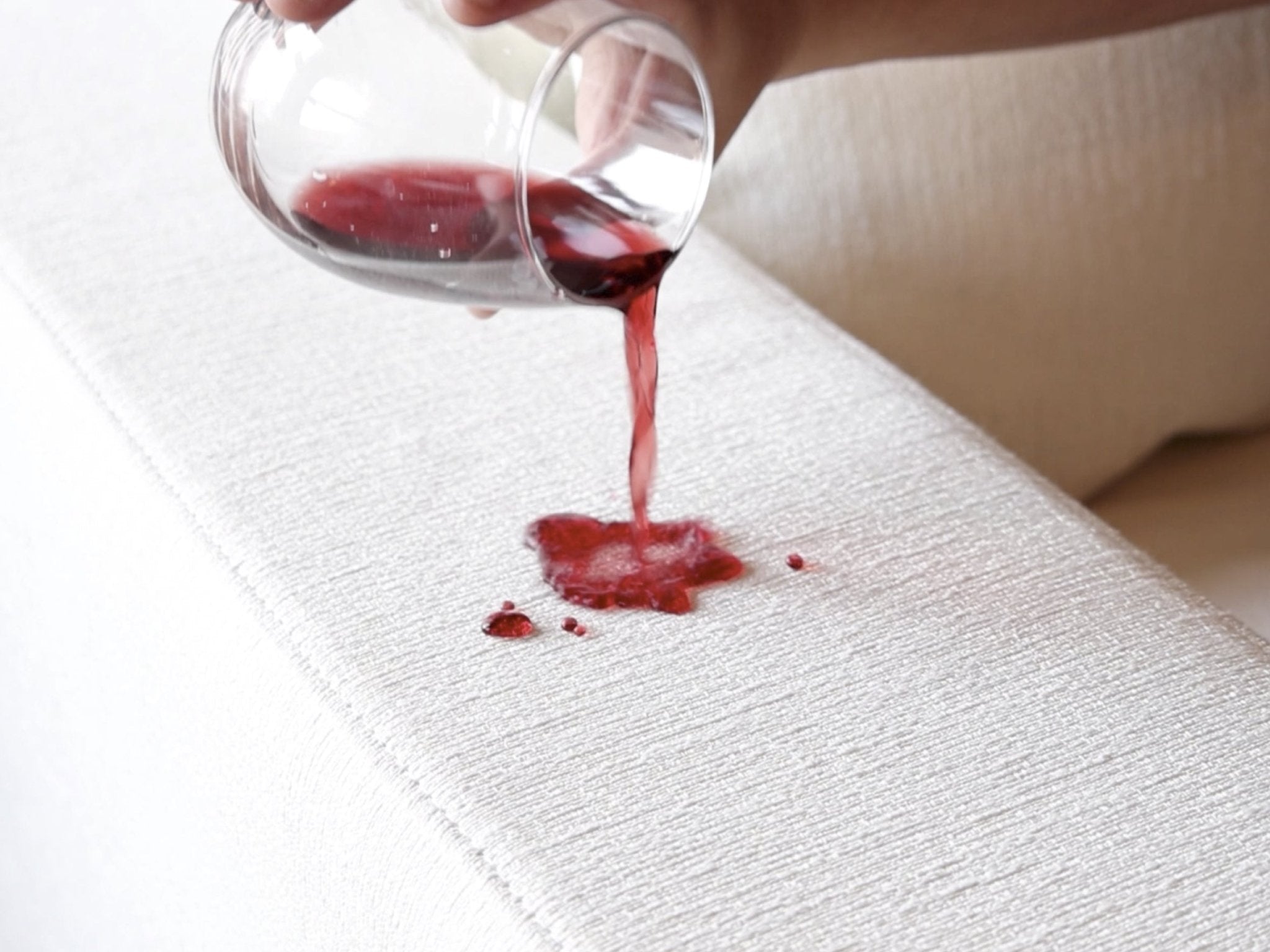 Sauce of red drink on fabric (not related to sofa)