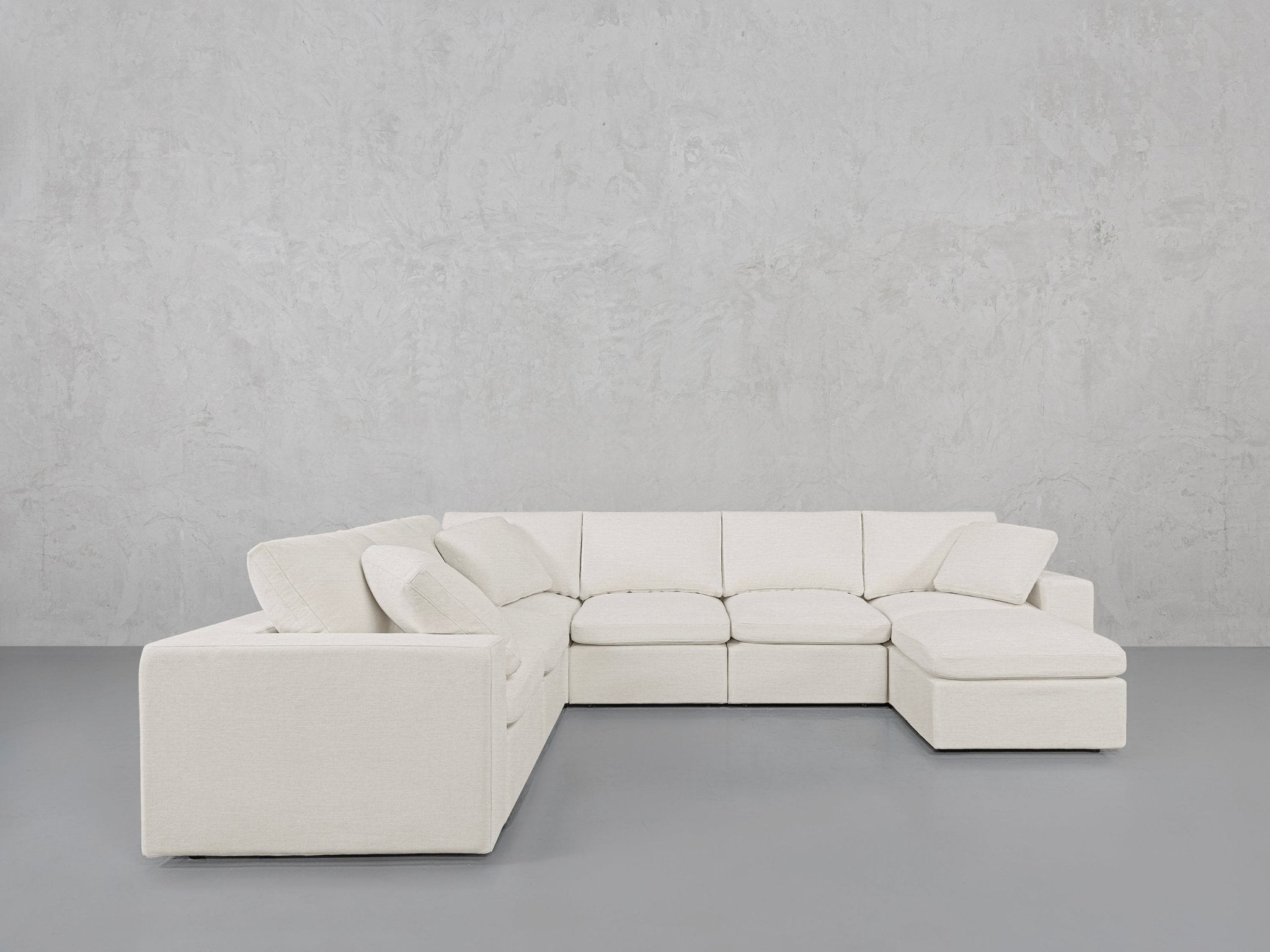 White sectional sofa with chaise