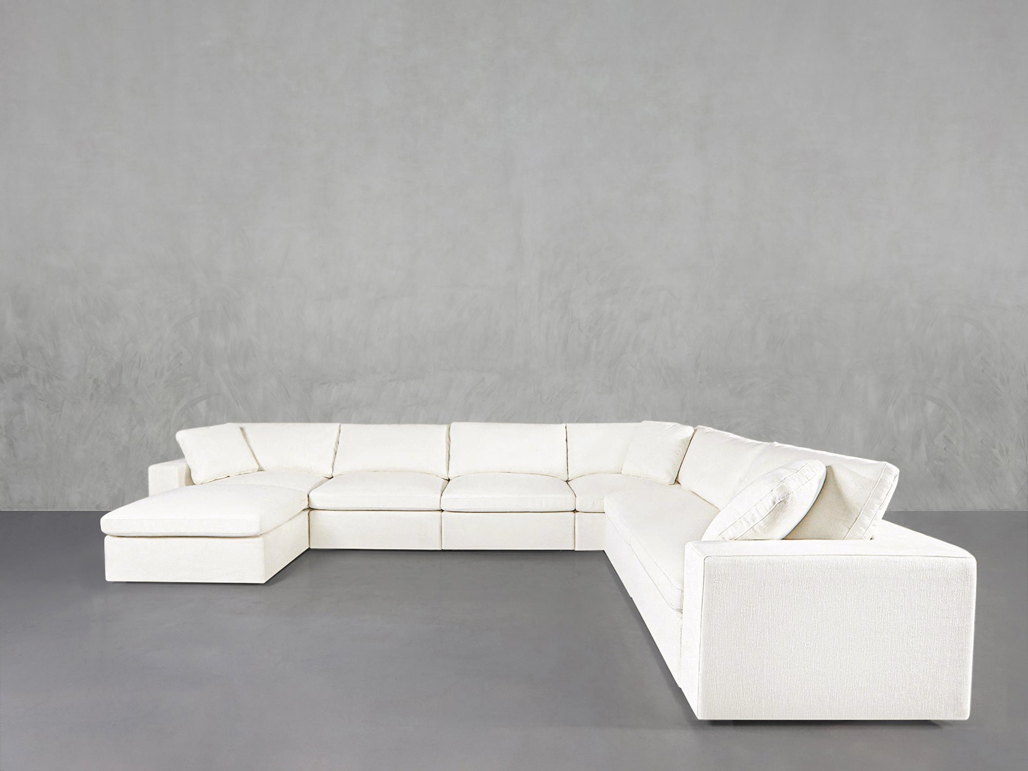 White sectional sofa with chaise, left side