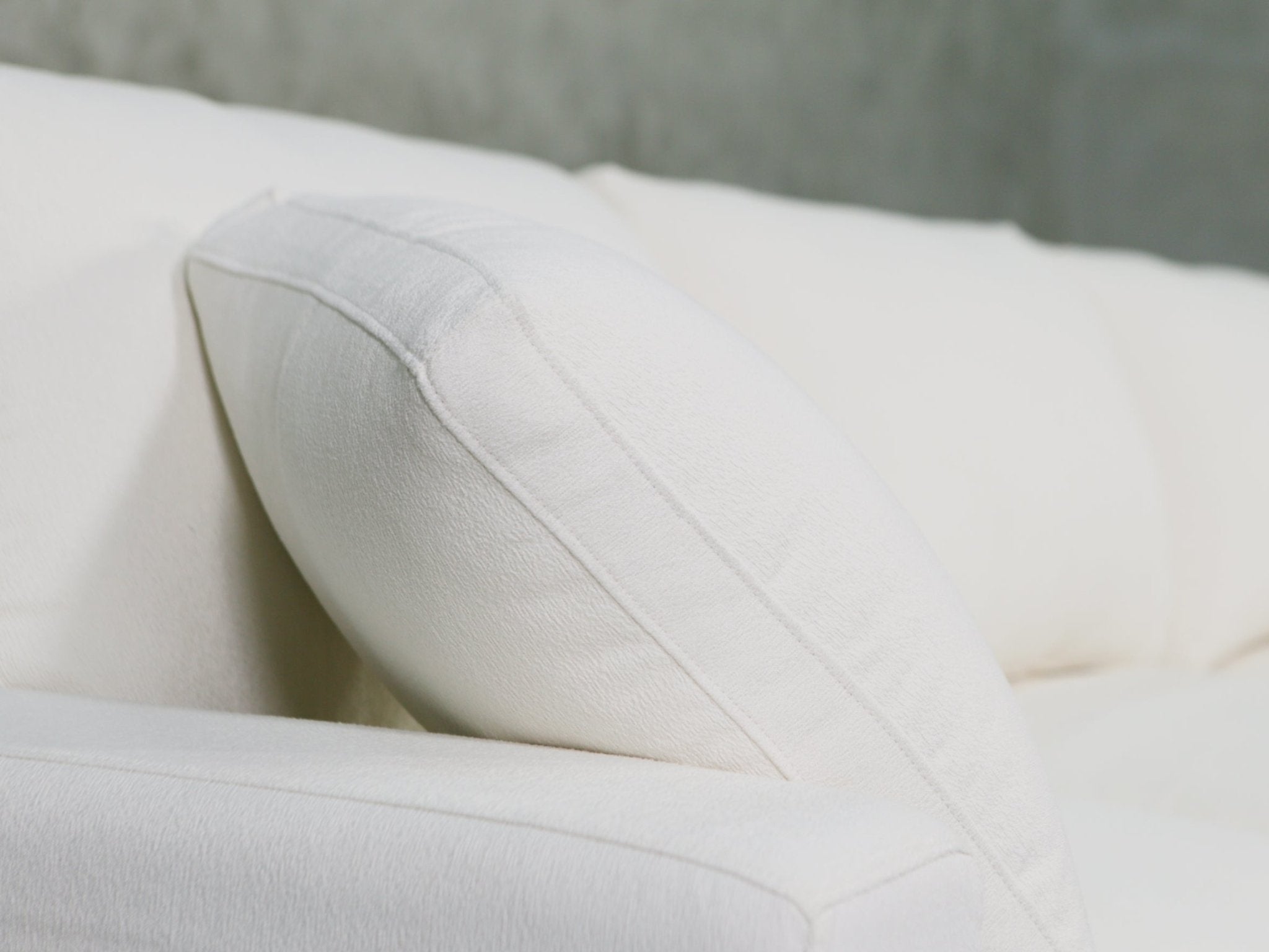Close-up of tufted cushion