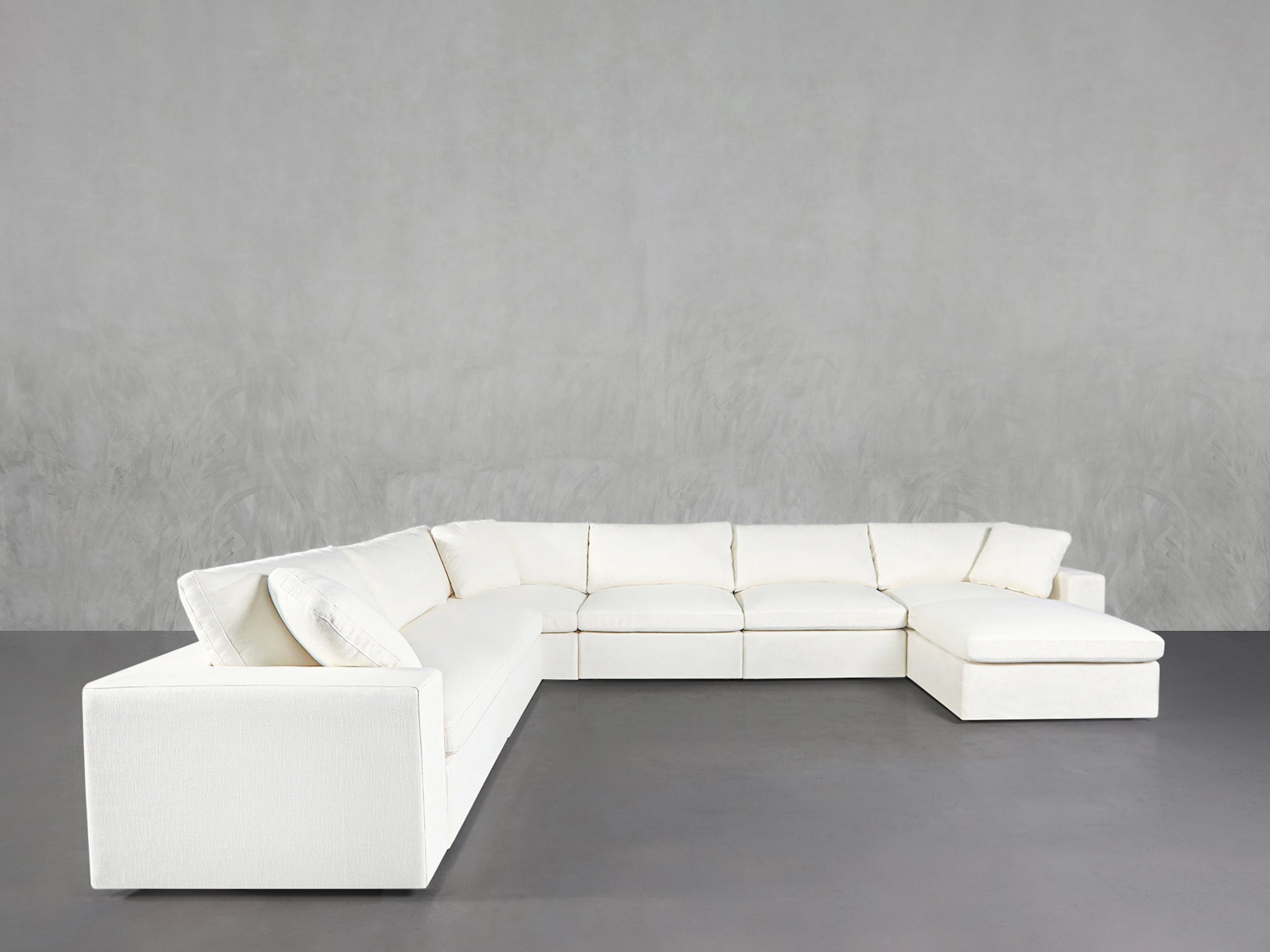White modular sofa collection on grey background